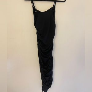 Perfect little black slinky dress! Size small. Worn once.